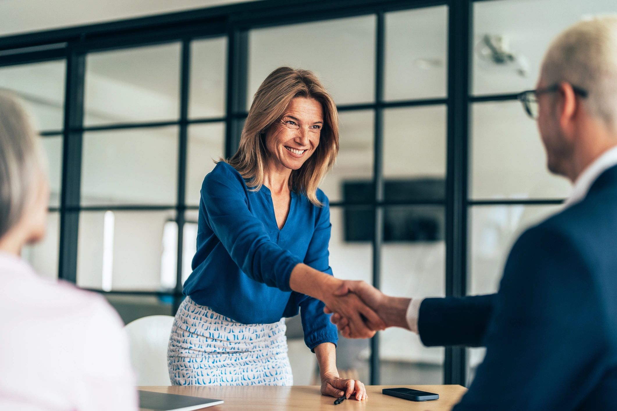 Business meeting and handshake